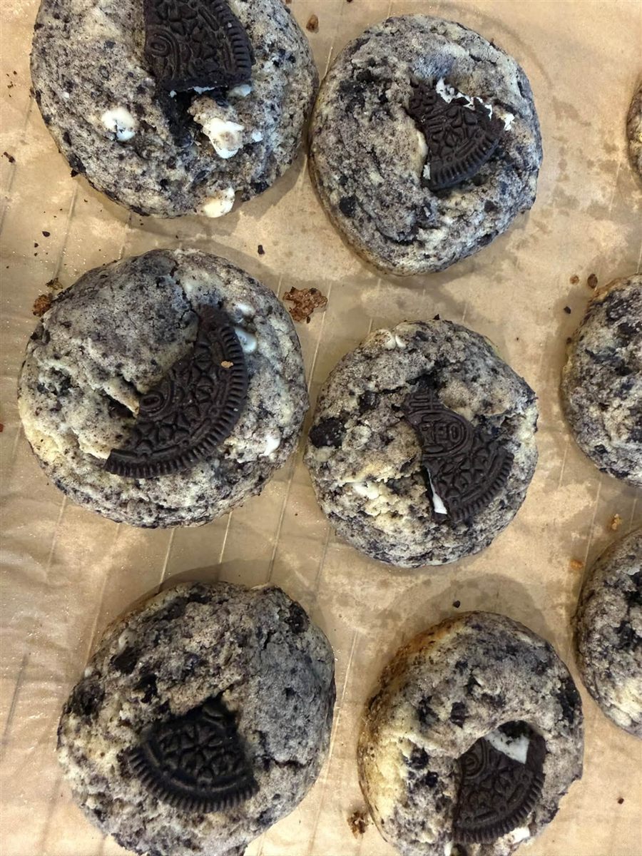 Brown butter cookies and cream cookies topped with Oreo pieces